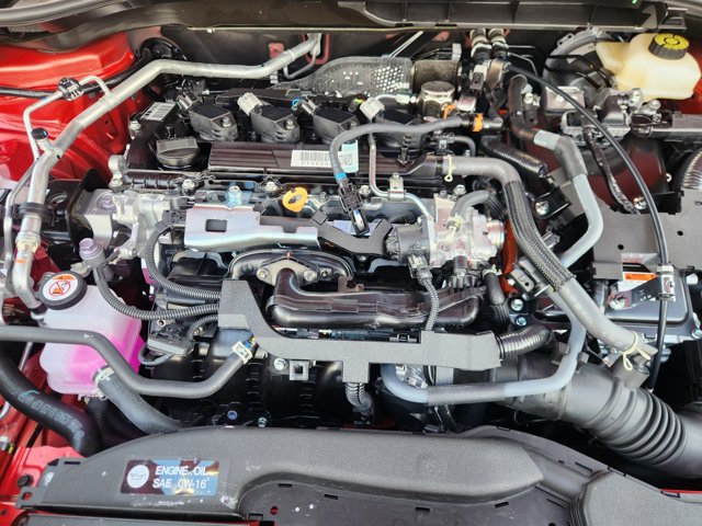 2026 Toyota Corolla Cross Hybrid SE Red at Classic Toyota Galveston