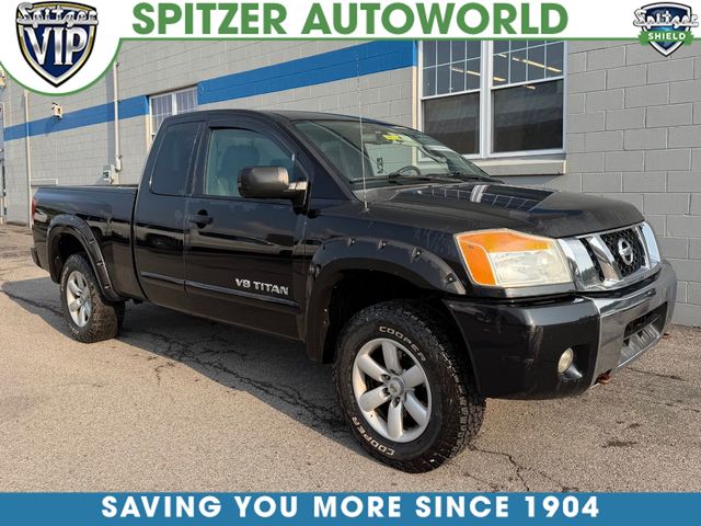 Galaxy Black Metallic 2010 Nissan Titan Pickup Truck Four-Wheel Drive 5-Speed Automatic