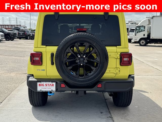 2023 Jeep Wrangler Sahara 4xe Yellow at DeMontrond Gulf Freeway
