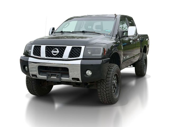 Black 2005 Nissan Titan LE Crew Cab 4WD Pickup Truck Four-Wheel Drive 5-Speed Automatic
