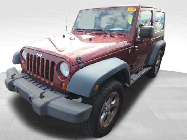 Red Rock Crystal Pearlcoat/Black Hard Top 2010 Jeep Wrangler SUV / Crossover Four-Wheel Drive 6-Speed Manual