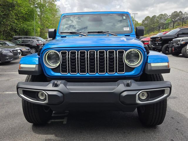 Used 2025 Blue Jeep Sahara image 2