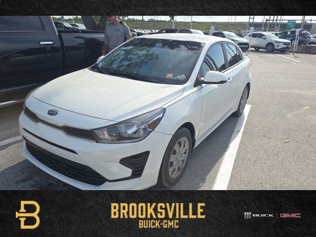 Clear White 2021 Kia Rio Sedan Front-Wheel Drive Continuously Variable Transmission