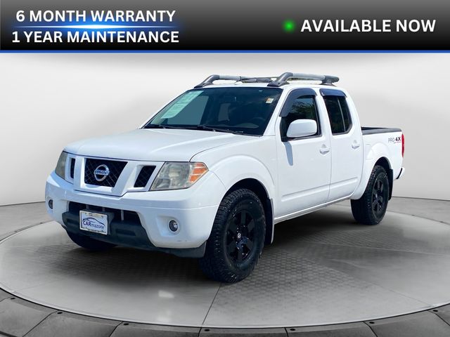 White (Fresh Powder) 2012 Nissan Frontier Pickup Truck Four-Wheel Drive 5-Speed Automatic Overdrive
