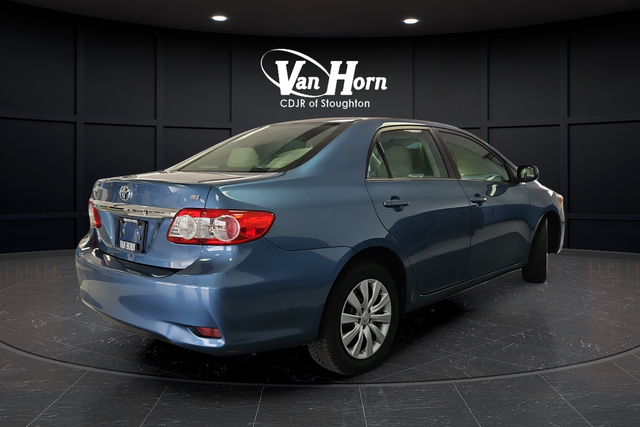 Used 2013 Tropical Sea Metallic Toyota LE image 7