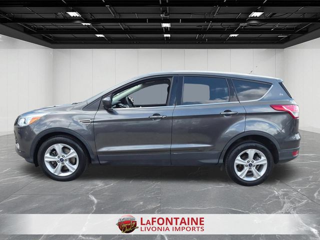 Used 2015 Ford Escape SE with VIN 1FMCU9GX5FUA66985 for sale in Livonia, MI