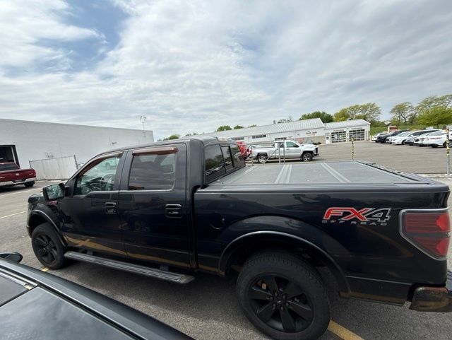 View vehicle photo 3