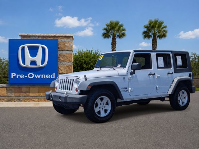 Used 2013 Bright White Clearcoat Jeep Unlimited Sport image 32