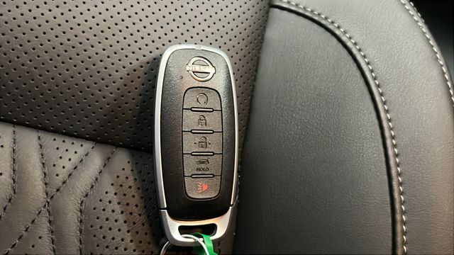 Used 2024 Super Black Nissan Platinum image 9