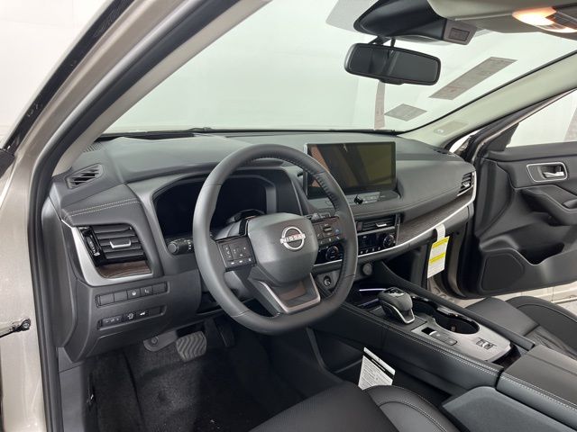 2025 Champagne Silver Metallic/Super Black Nissan Rogue Platinum FWD SUV