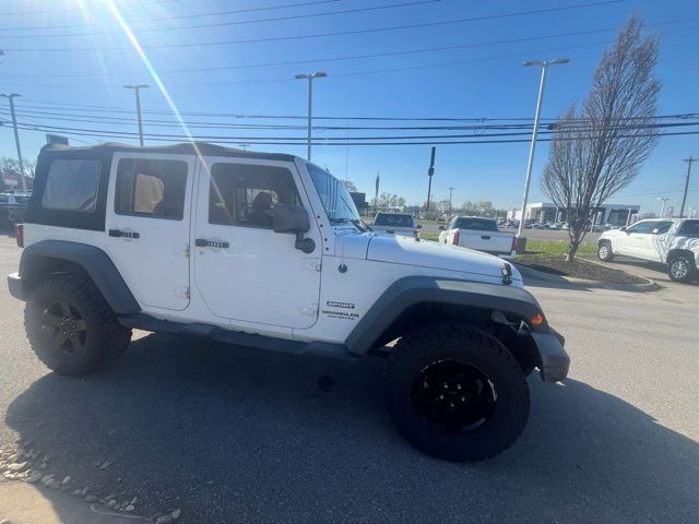 Bright White Clearcoat 2016 Jeep Wrangler Unlimited Sport 4WD SUV / Crossover Four-Wheel Drive 6-Speed Manual