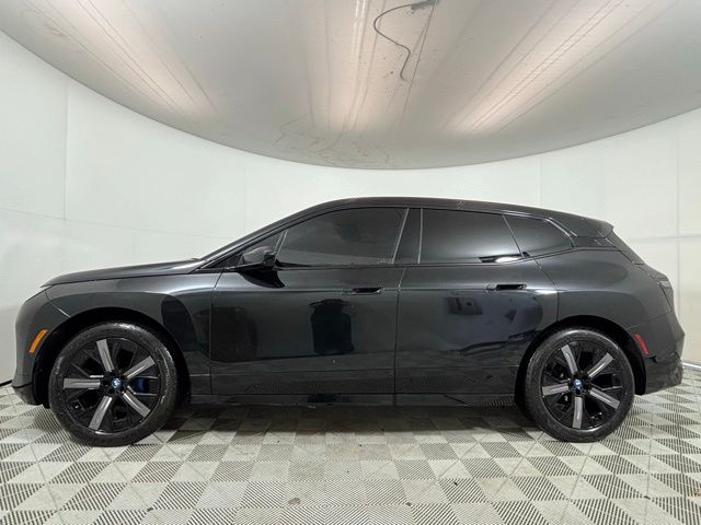 Used 2023 Black BMW xDrive50 image 4