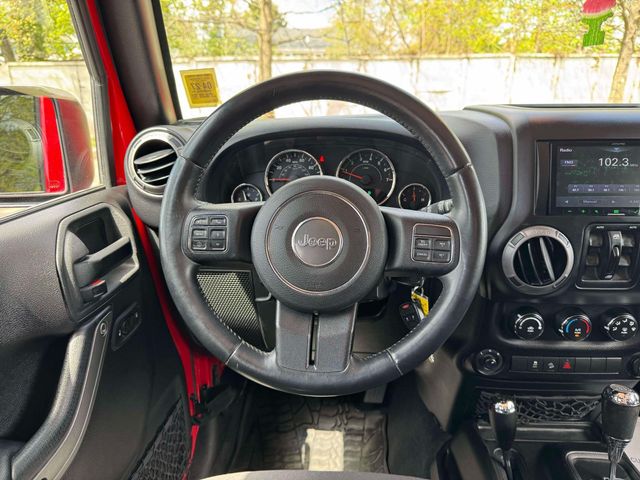 used 2015 Jeep Wrangler car, priced at $19,576