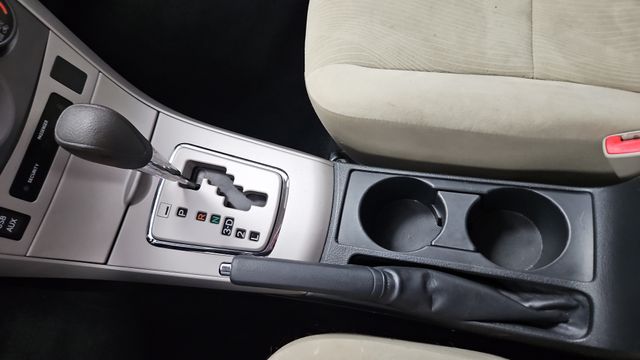 Used 2013 Tropical Sea Metallic Toyota LE image 19