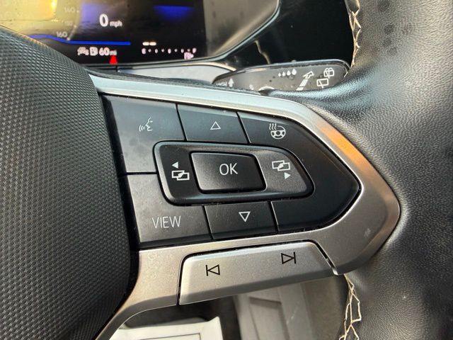 used 2024 Volkswagen Taos car, priced at $23,220