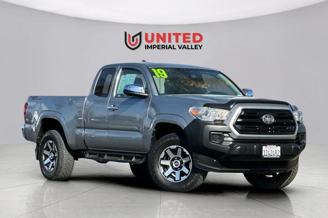 Silver Sky Metallic 2019 Toyota Tacoma SR I4 Access Cab RWD Pickup Truck 4X2 6-Speed Automatic