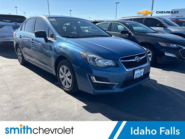 Quartz Blue Pearl 2015 Subaru Impreza Sedan All-Wheel Drive 5-Speed Manual
