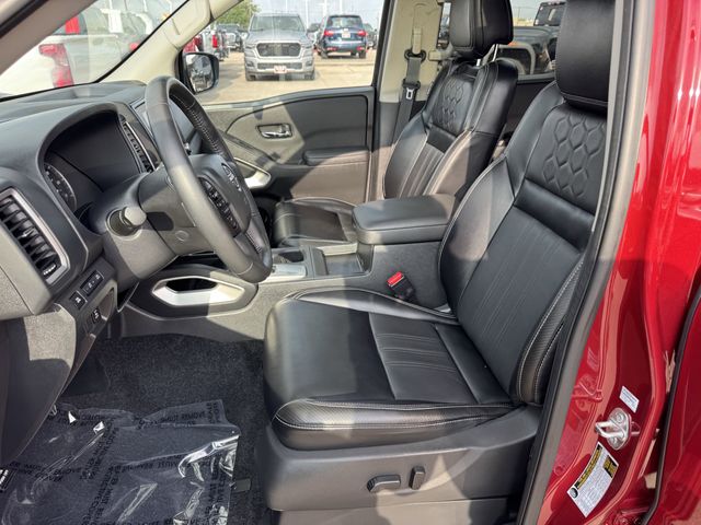 2024 Nissan Frontier SL Red at DeMontrond Auto Country