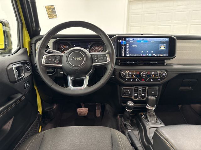 used 2024 Jeep Wrangler car, priced at $33,566