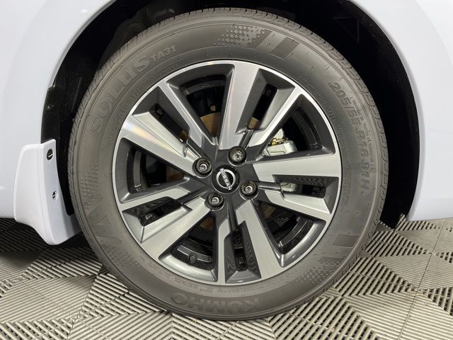 2025 Gray Sky Pearl Nissan Versa 1.6 SV FWD Sedan