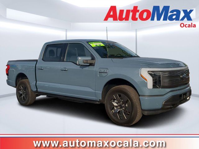 Blue (Azure Gray Metallic Tri-Coat) 2023 Ford F-150 Lightning Lariat SuperCrew AWD Pickup Truck All-Wheel Drive Automatic