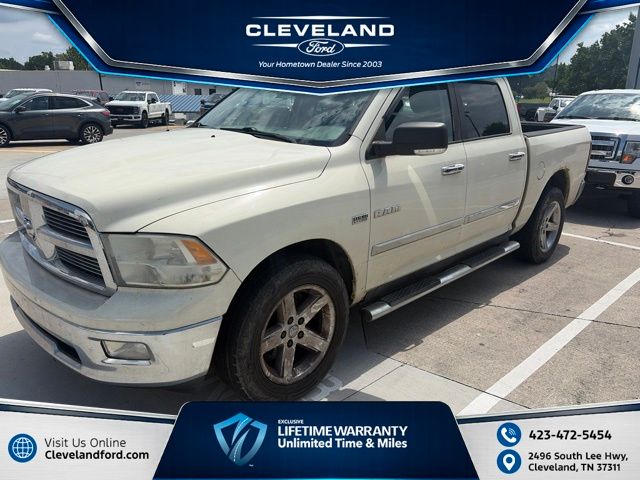 Cool Vanilla Clearcoat 2010 Dodge RAM 1500 Pickup Truck Four-Wheel Drive 5-Speed Automatic