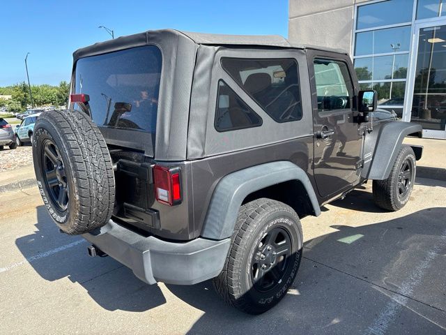 Used 2016 Jeep Wrangler Sport with VIN 1C4AJWAG9GL329062 for sale in Kansas City