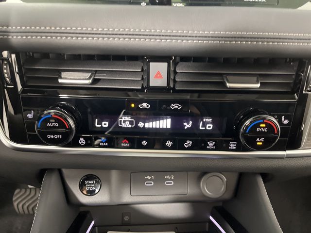2025 Champagne Silver Metallic/Super Black Nissan Rogue Platinum FWD SUV