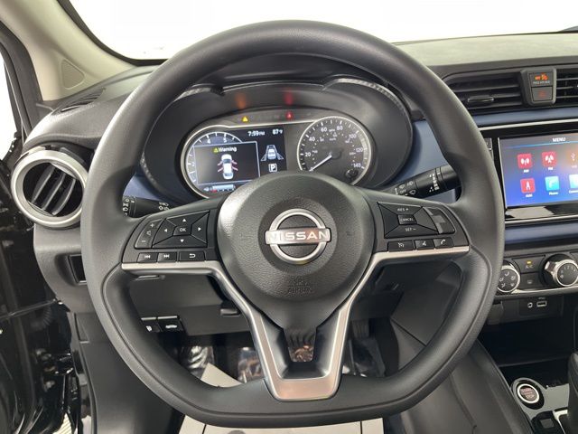 2025 Super Black Metallic Nissan Versa 1.6 SV FWD Sedan