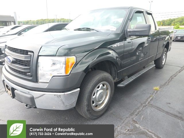 Green 2014 Ford F-150 Pickup Truck Four-Wheel Drive 6-Speed Automatic