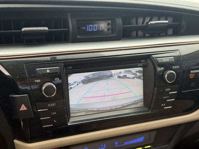 2015 Toyota Corolla LE Brown at Texan Dodge Chrysler Jeep Ram