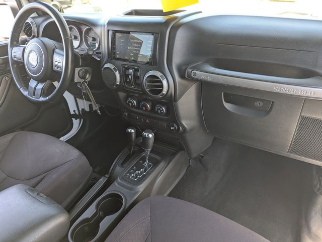 Used 2013 Bright White Clearcoat Jeep Unlimited Sport image 11