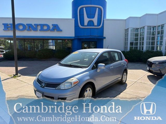 Arctic Blue 2009 Nissan Versa Sedan Front-Wheel Drive 4-Speed Automatic