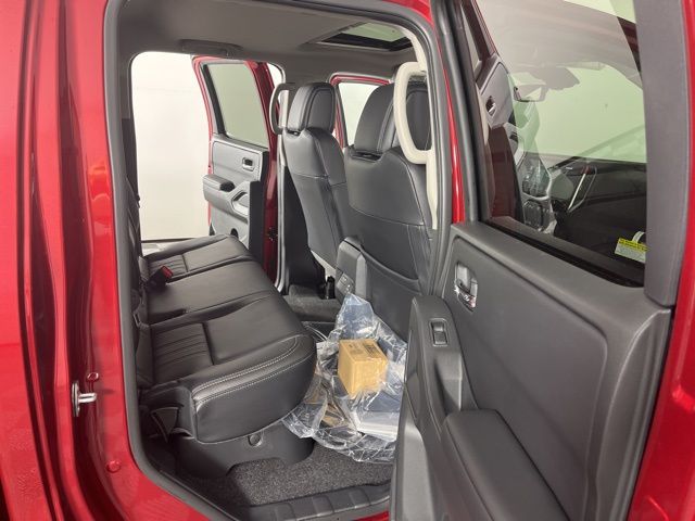 2025 Cardinal Red Metallic Tricoat Nissan Frontier SL RWD Truck