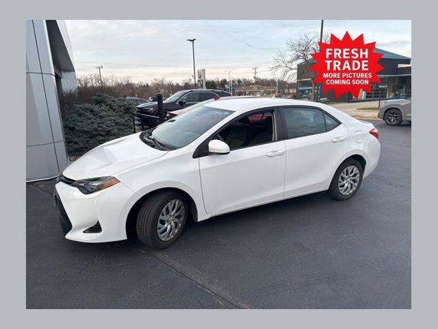 Super White 2019 Toyota Corolla Sedan Continuously Variable Transmission