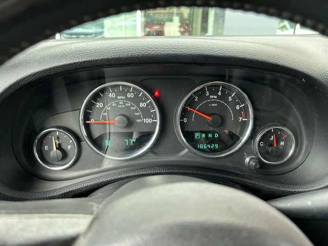 Used 2014 Red Jeep Unlimited Sahara image 22