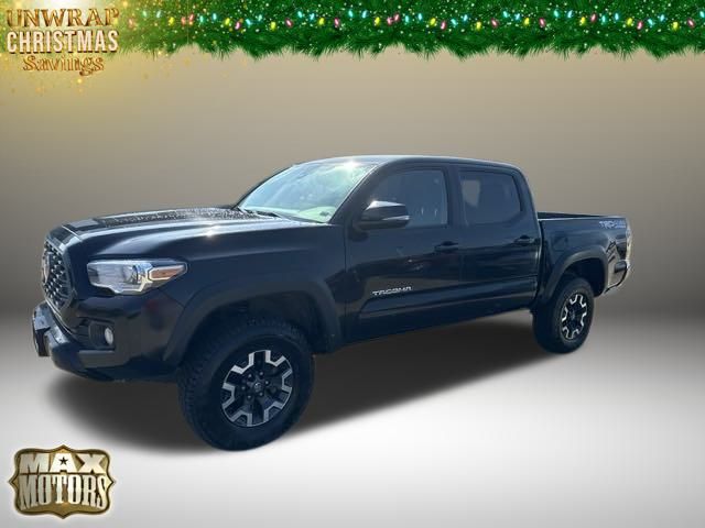 Used 2022 Toyota Tacoma TRD Off-Road with VIN 3TMCZ5ANXNM460734 for sale in Kansas City