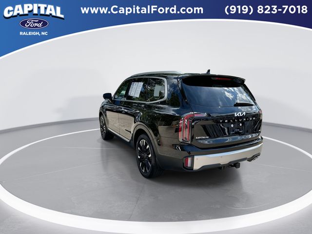 Used 2024 Ebony Black Kia SX-Prestige image 6