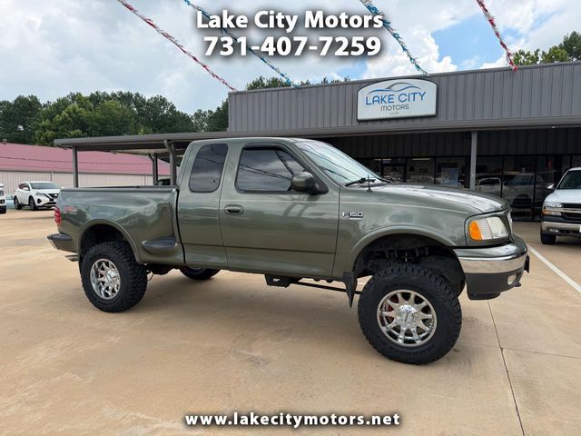 Green 2002 Ford F-150 Pickup Truck Four-Wheel Drive