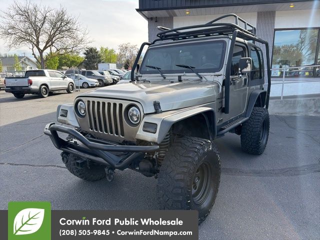 Brown (Beige) 2001 Jeep Wrangler Sport SUV / Crossover Four-Wheel Drive 3-Speed Automatic