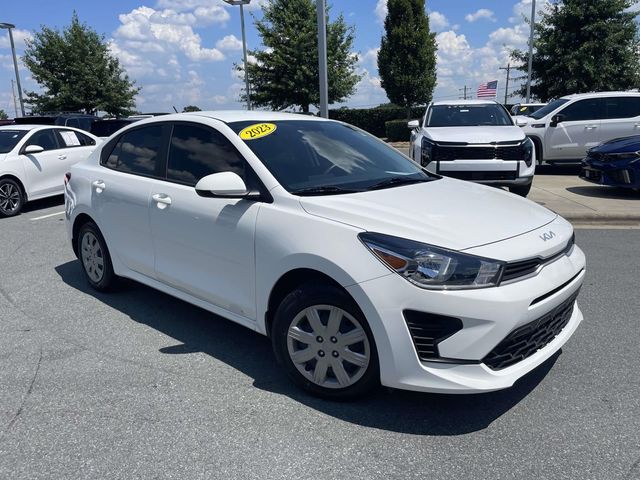 Clear White 2023 Kia Rio Sedan Front-Wheel Drive Continuously Variable Transmission