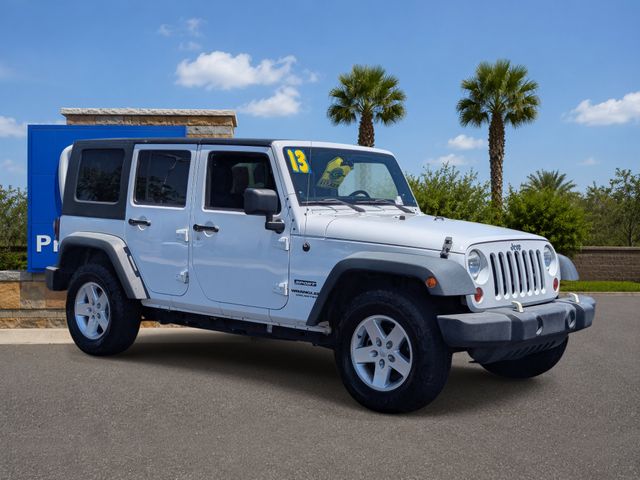 Used 2013 Bright White Clearcoat Jeep Unlimited Sport image 7