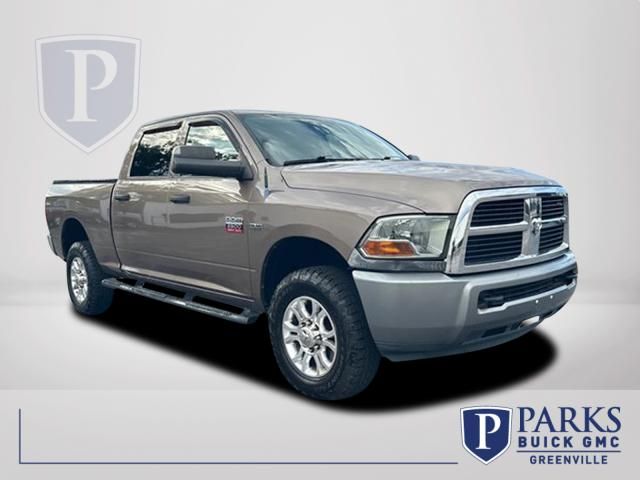 Brown (Tan Pearl) 2010 Dodge RAM 2500 Pickup Truck Four-Wheel Drive 5-Speed Automatic