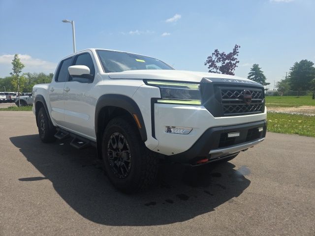 Glacier White 2023 Nissan Frontier Pickup Truck Four-Wheel Drive 9-Speed Automatic