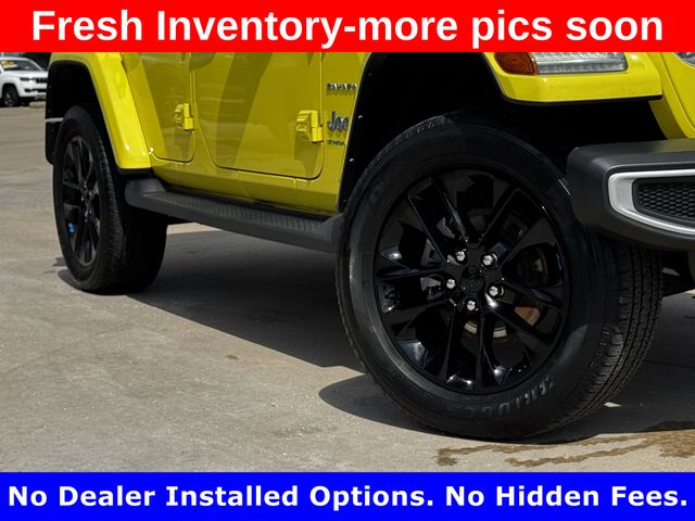 2023 Jeep Wrangler Sahara 4xe Yellow at DeMontrond Gulf Freeway