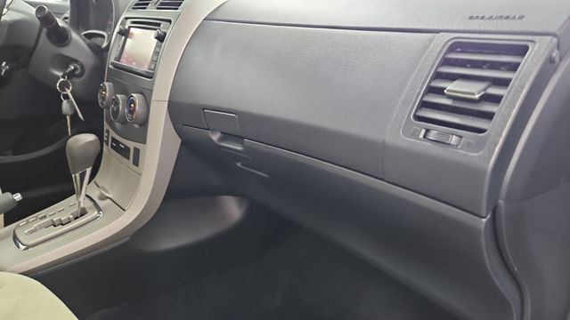 Used 2013 Tropical Sea Metallic Toyota LE image 25