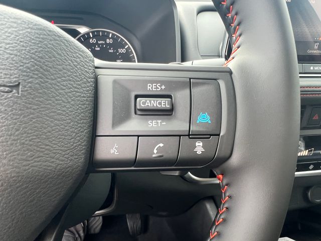 2025 Baja Storm Metallic Nissan Rogue Rock Creek AWD SUV