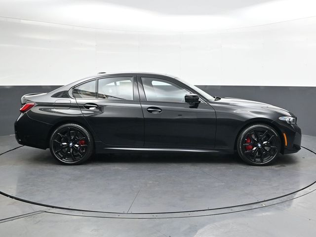 New 2026 Black BMW 330i xDrive image 3
