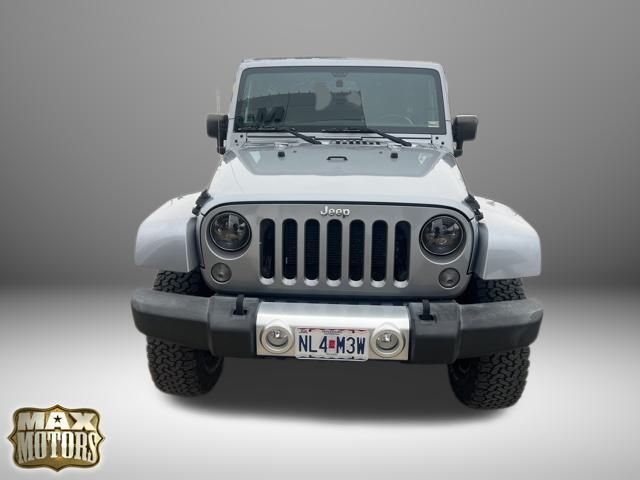 Used 2015 Jeep Wrangler Unlimited Sahara with VIN 1C4HJWEG3FL551345 for sale in Kansas City