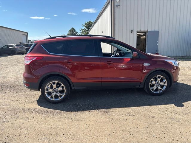 2016 Orange Ford Escape SE 4X4 SUV